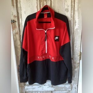 Nike Air Men's Half-Zip Pullover Jacket in University Red and Black.